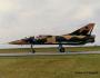 Mirage IIIBZ 817 taxiing in after landing in 1993 at George Airport. Note the tailpipe has been burned through on the underside by a malfunctioning afterburner. The aircraft performed one circuit and landed safely.