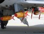 120kg inert practice bombs under a Cheetah C.