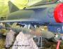 A laser-guided bomb displayed with a Cheetah C.