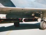 Cluster bomb carried under a Cheetah aircraft.